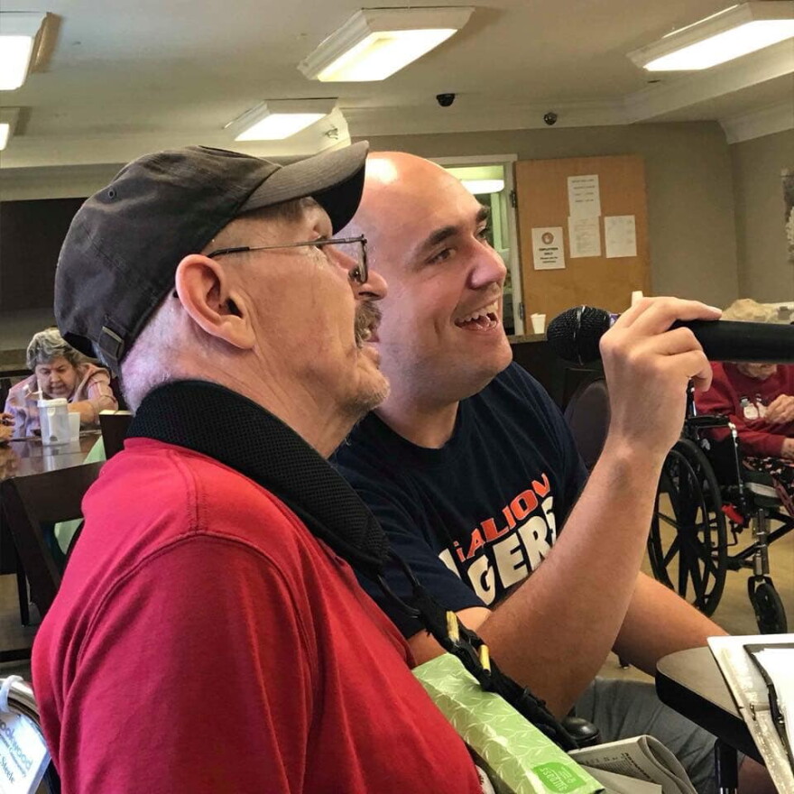 Doug Steele (left) and his son Matthew enjoy a visit at the Cincinnati facility where Doug lives.